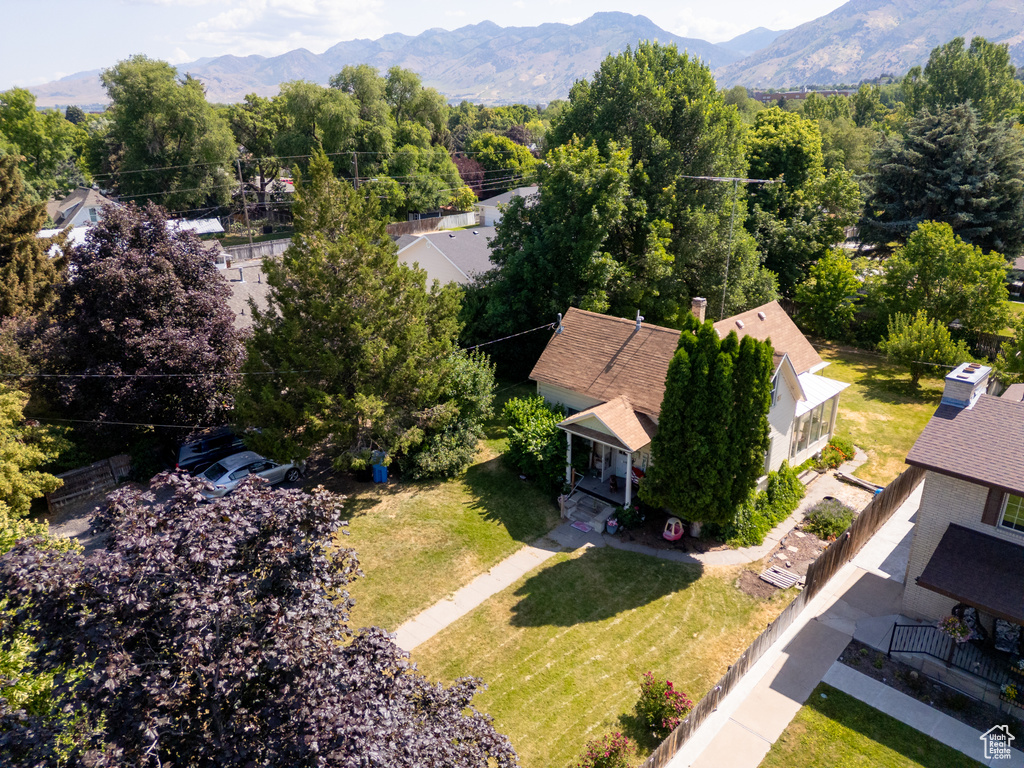 View of subject property with mountains