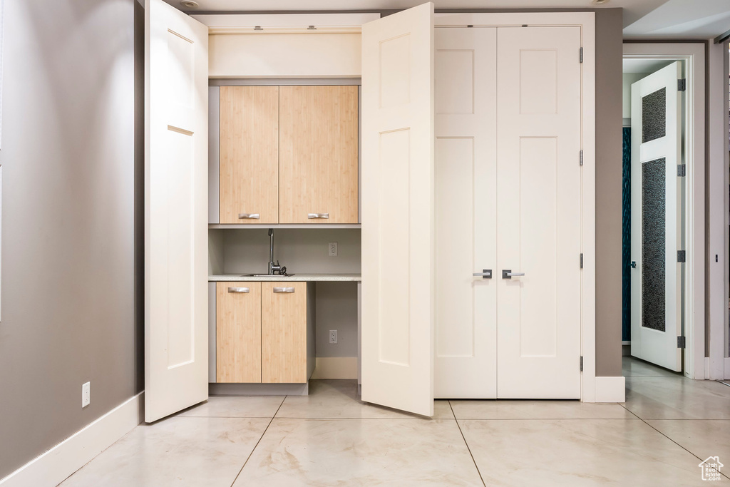 Unfurnished bedroom with a closet and baseboards