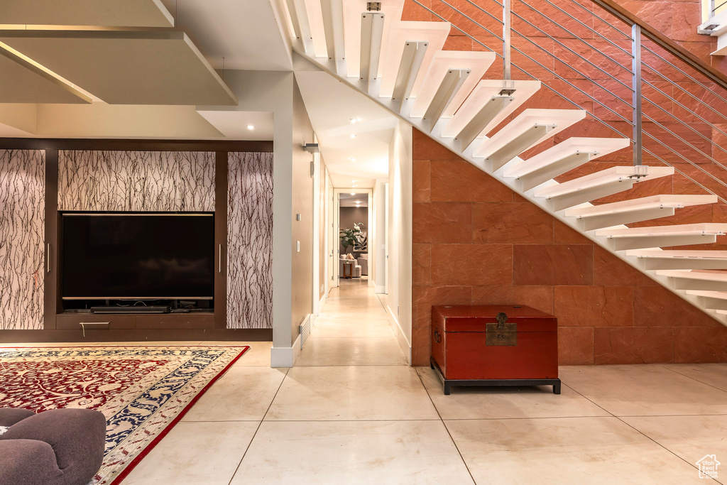 Stairway featuring tile patterned flooring