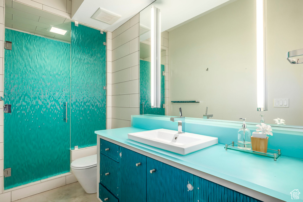 Bathroom featuring vanity, tile patterned flooring, and bathing tub / shower combination