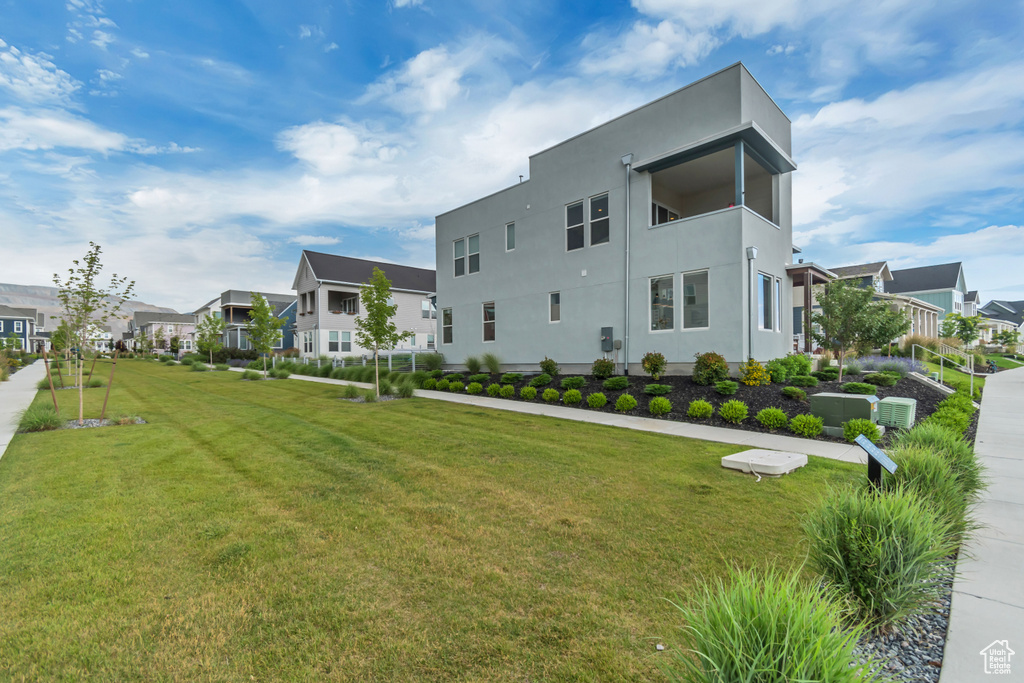 View of property with a residential view