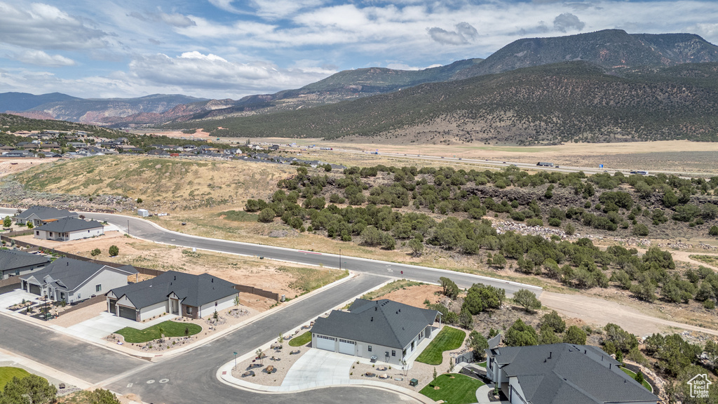Aerial view of residential area featuring mountains