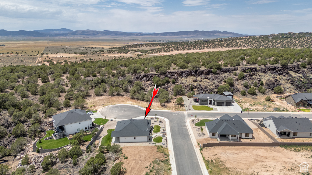 Aerial view of residential area with mountains