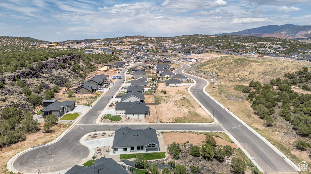 Aerial view of residential area with a mountain backdrop