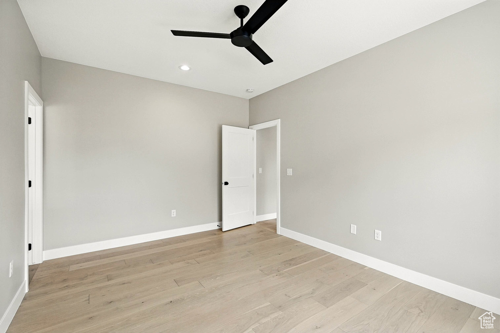 Unfurnished bedroom with light wood finished floors, recessed lighting, and ceiling fan