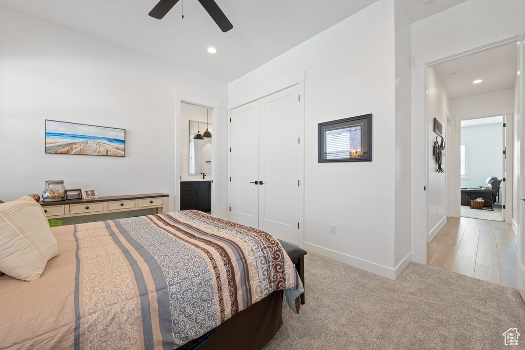 Carpeted bedroom featuring a closet, recessed lighting, and ceiling fan