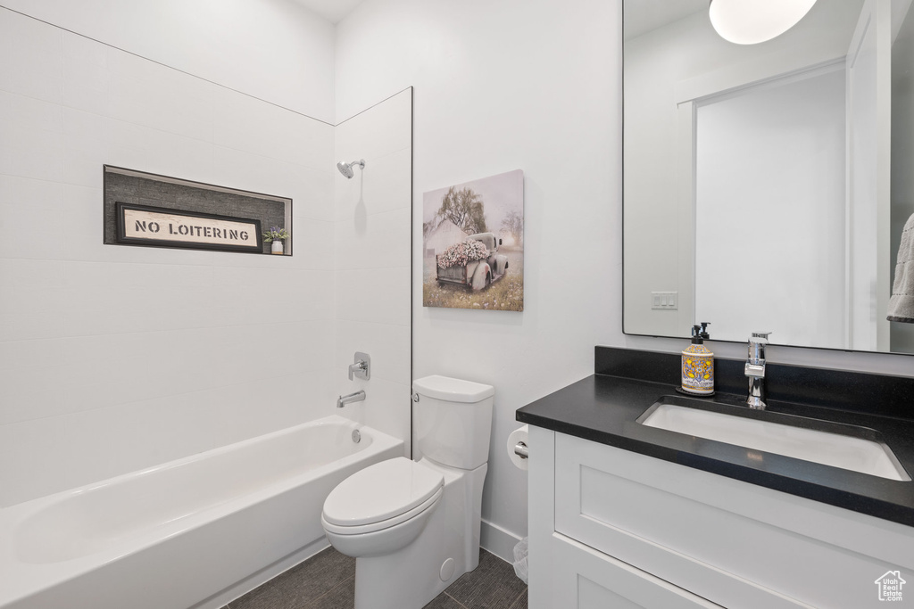 Full bathroom with vanity and bathing tub / shower combination