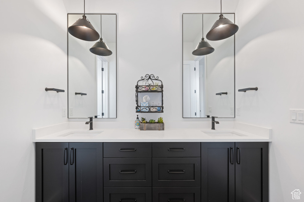 Full bathroom featuring double vanity