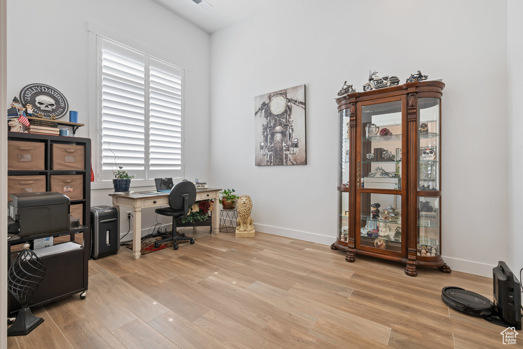 Office area with wood finished floors