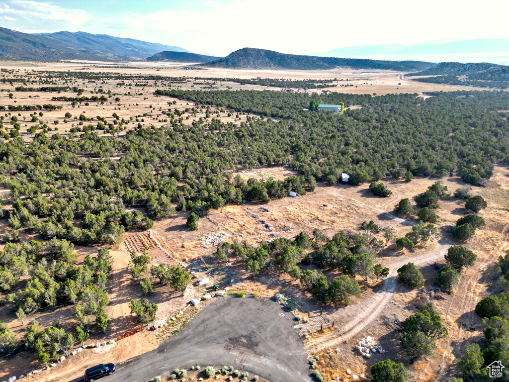 Aerial overview of property\\\\\\\'s location featuring a mountainous background and rural landscape
