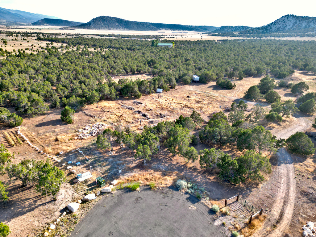 Aerial view of sparsely populated area with a mountainous background