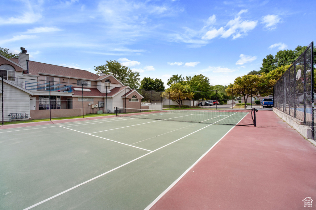 View of tennis court featuring community basketball court