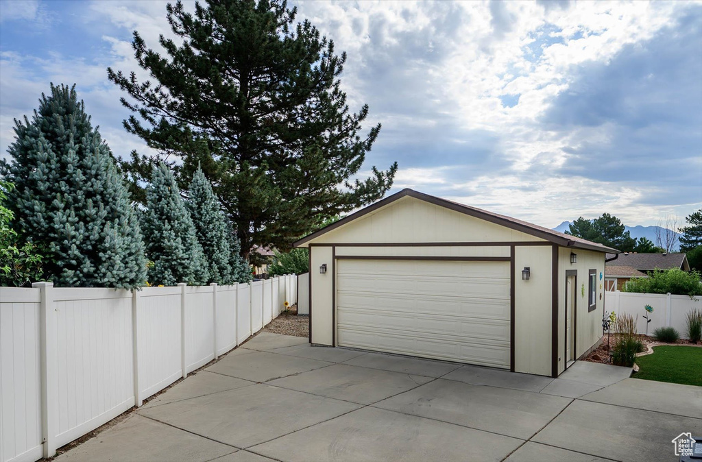 Detached garage with a mountain view