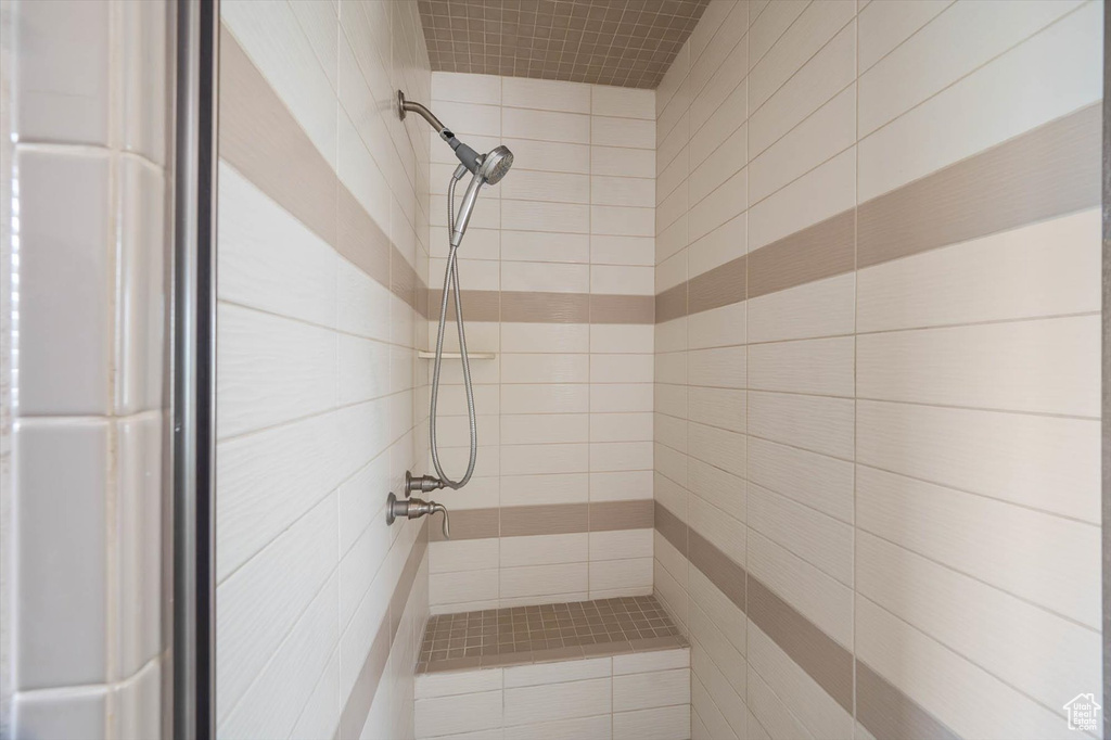Full bath with tiled shower