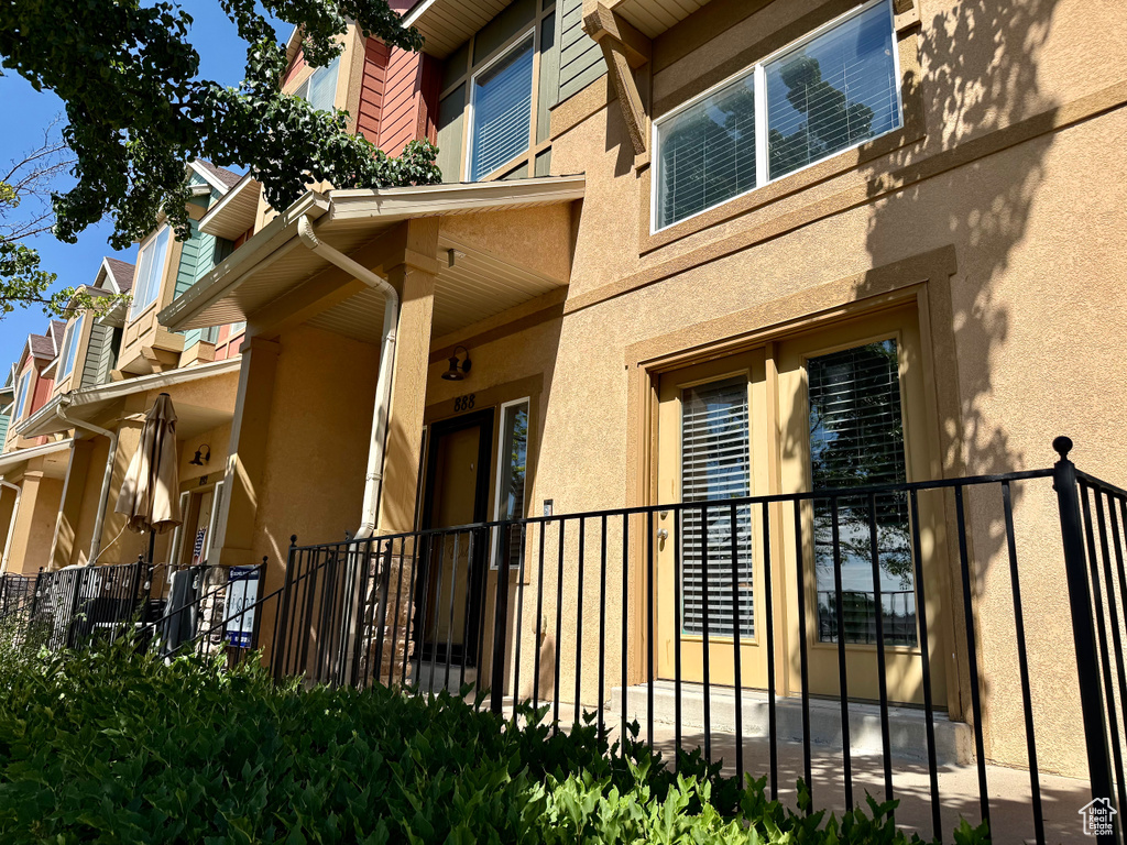 View of property exterior with stucco siding