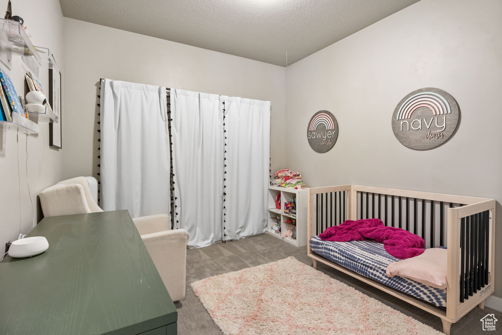 Bedroom featuring carpet flooring