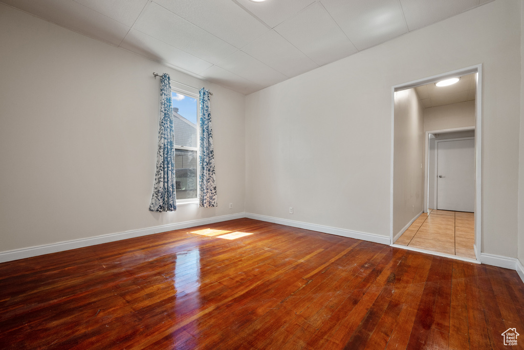 Spare room featuring hardwood / wood-style flooring