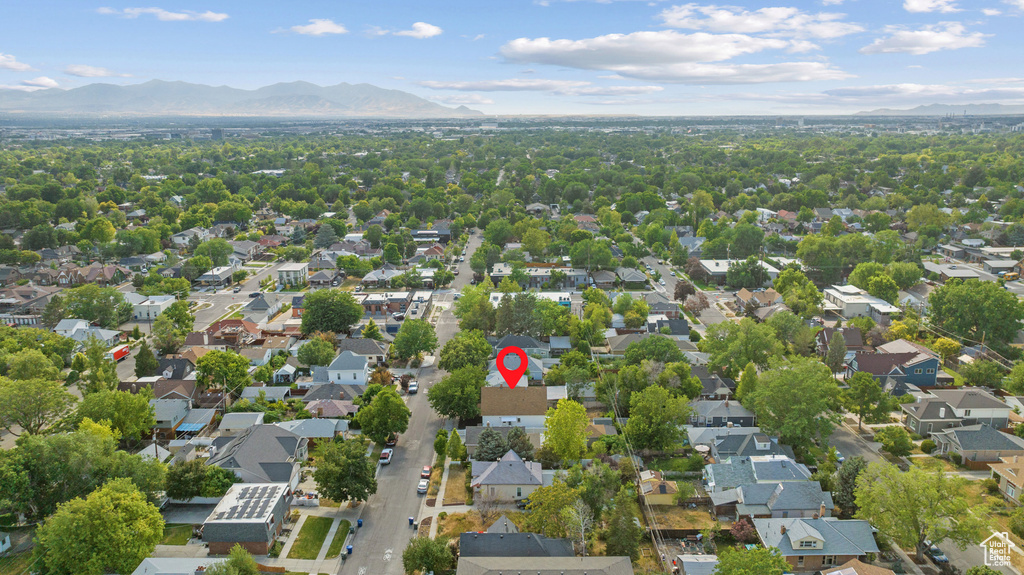 Aerial view of residential area featuring mountains