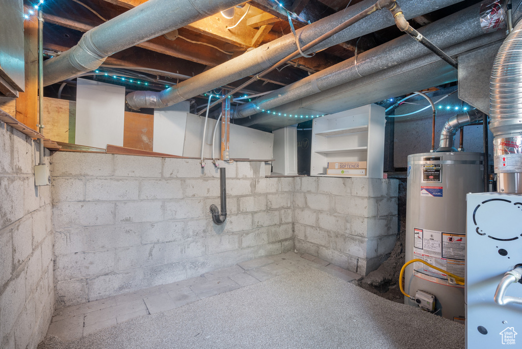 Unfinished below grade area with gas water heater