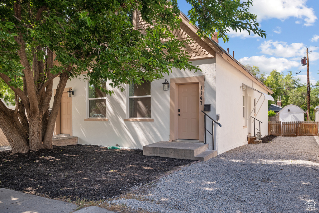 View of front of home featuring stucco siding