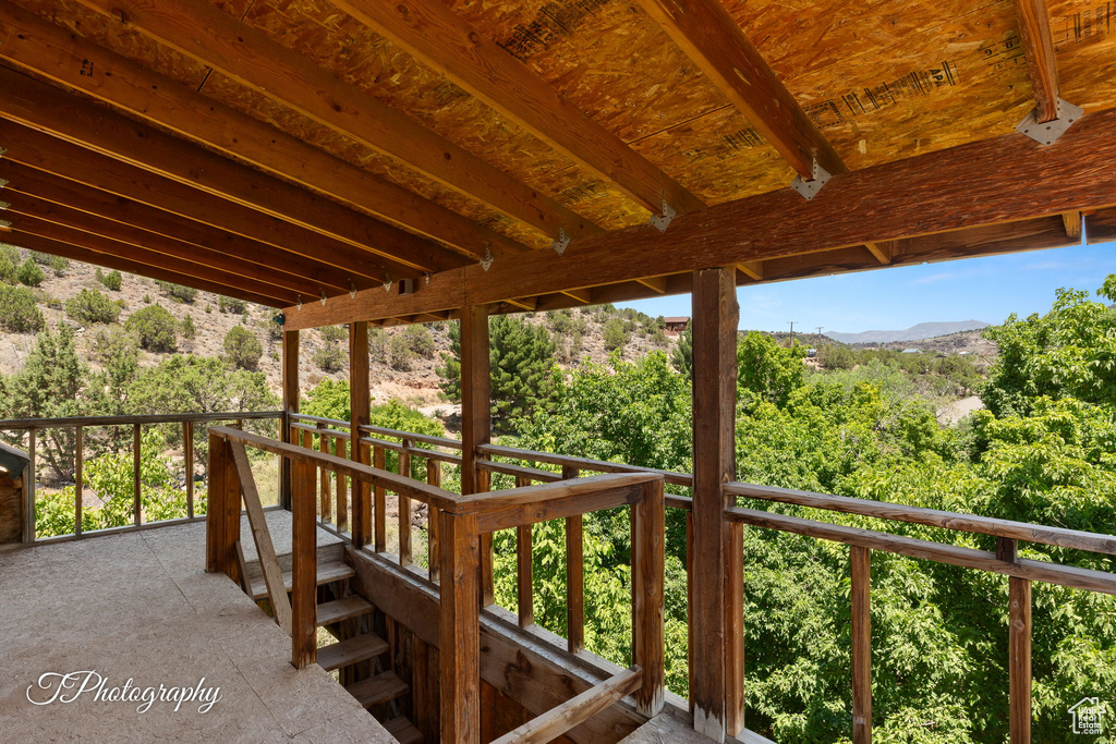 Wooden deck featuring a mountain view