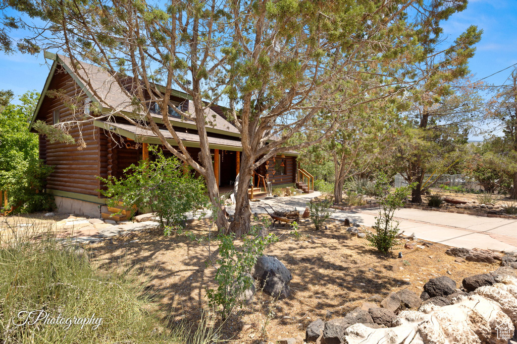 View of front of home with log siding