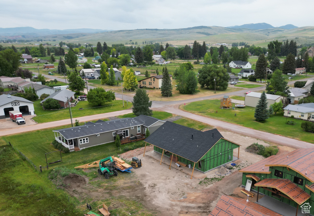 Aerial view of residential area with a mountain backdrop