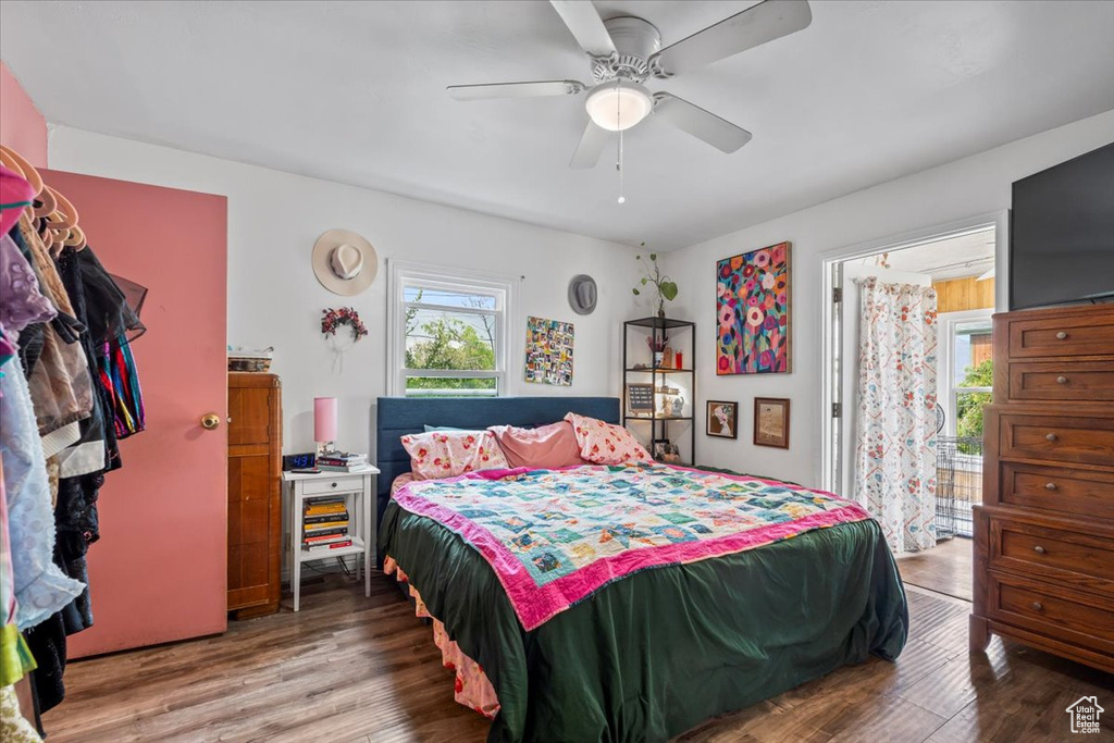 Bedroom featuring wood finished floors and a ceiling fan