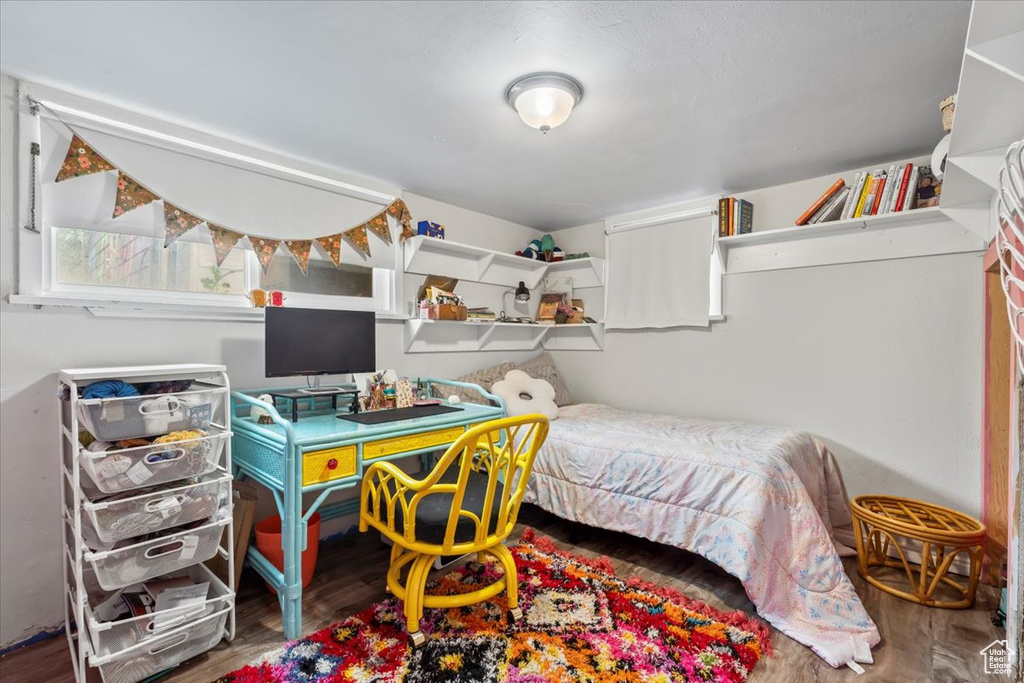 Bedroom featuring wood finished floors