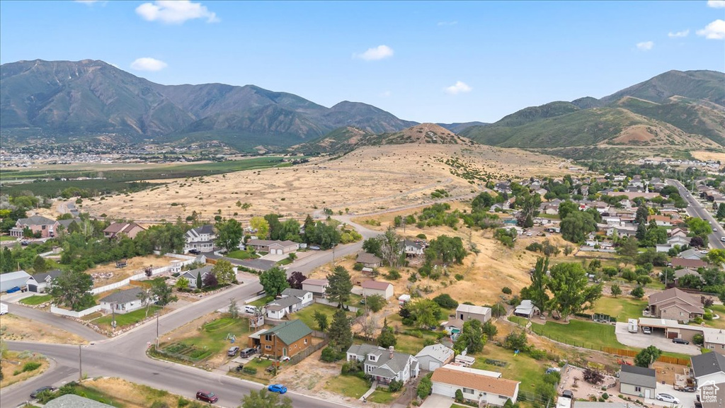 Aerial view of property\\\'s location featuring mountains and nearby suburban area