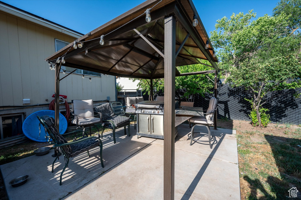 View of patio / terrace with a gazebo