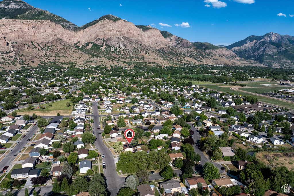 Aerial view of property\'s location with nearby suburban area