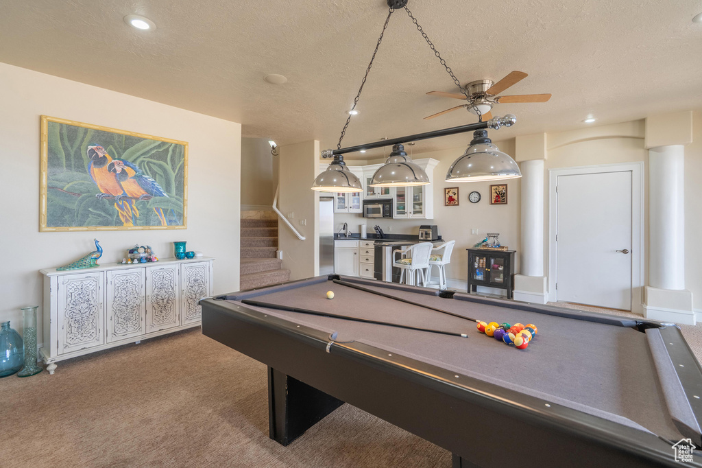 Playroom with pool table, a textured ceiling, a ceiling fan, carpet flooring, and recessed lighting