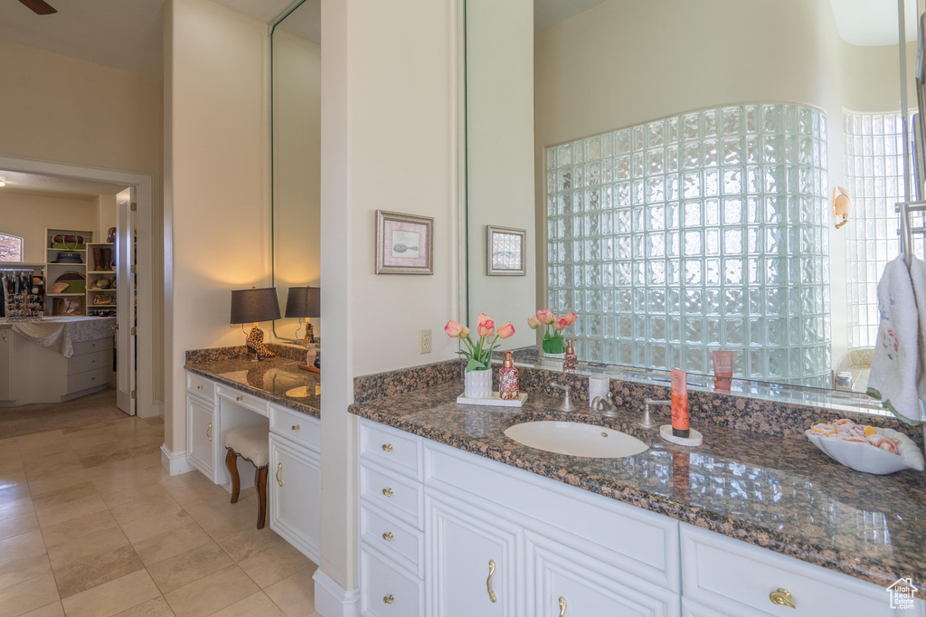 Bathroom featuring vanity and tile patterned floors
