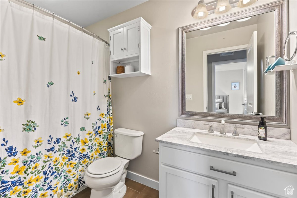 Full bath featuring vanity and a shower with curtain