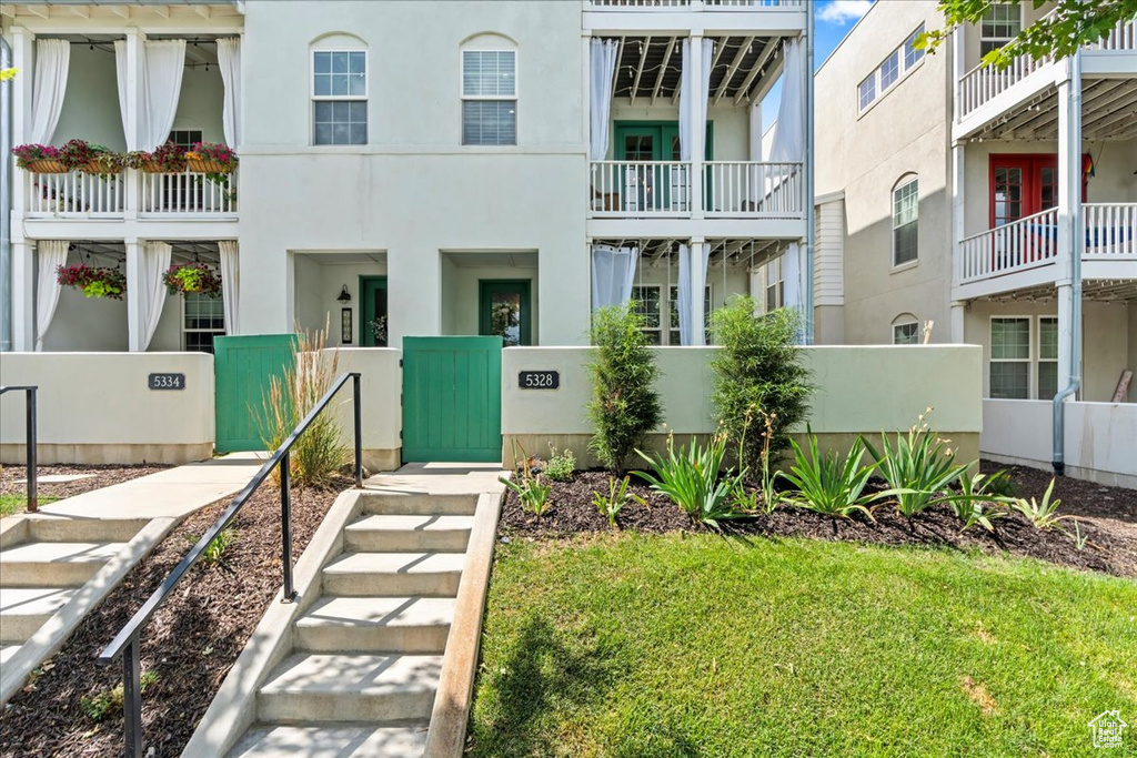 View of front of property featuring stucco siding
