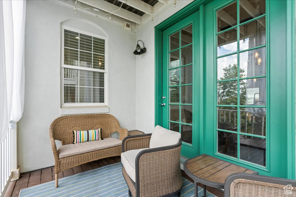 Balcony featuring french doors