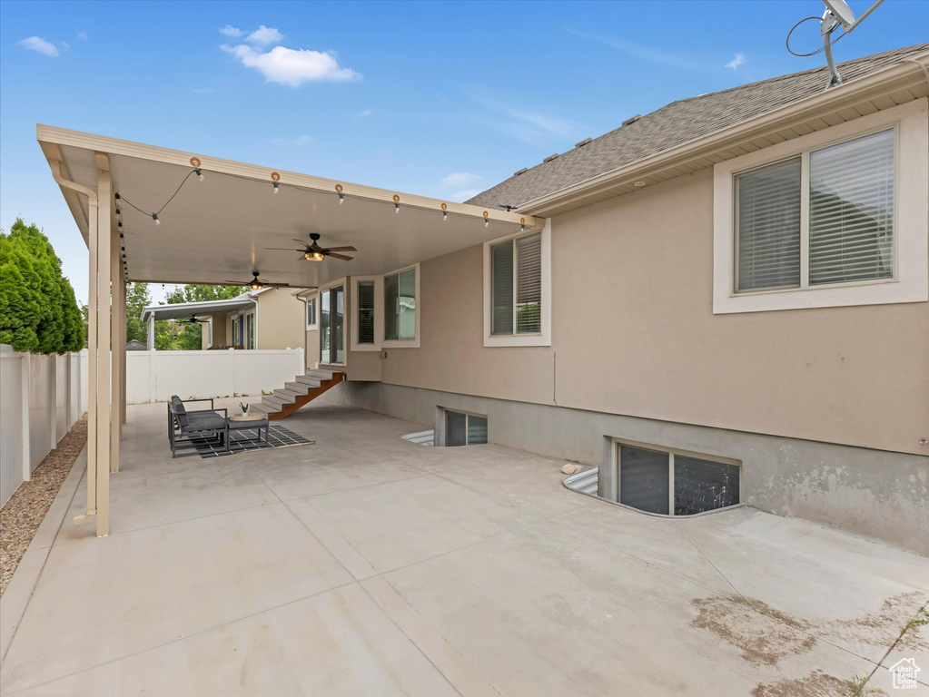View of patio featuring ceiling fan