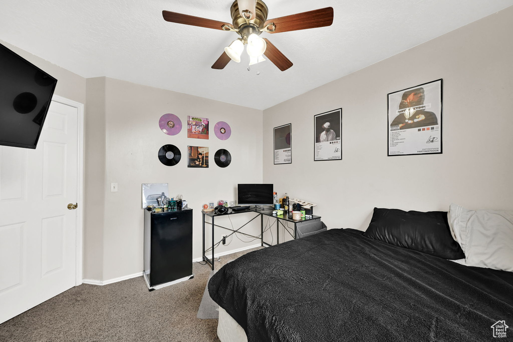 Bedroom featuring carpet floors and a ceiling fan