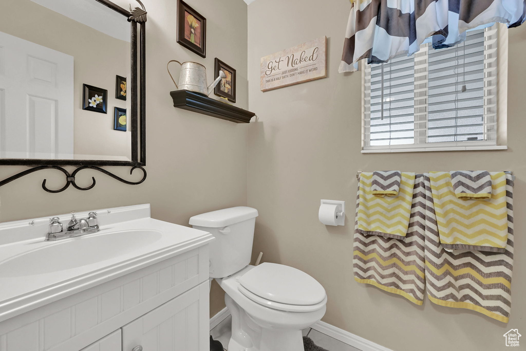 Bathroom with toilet and vanity
