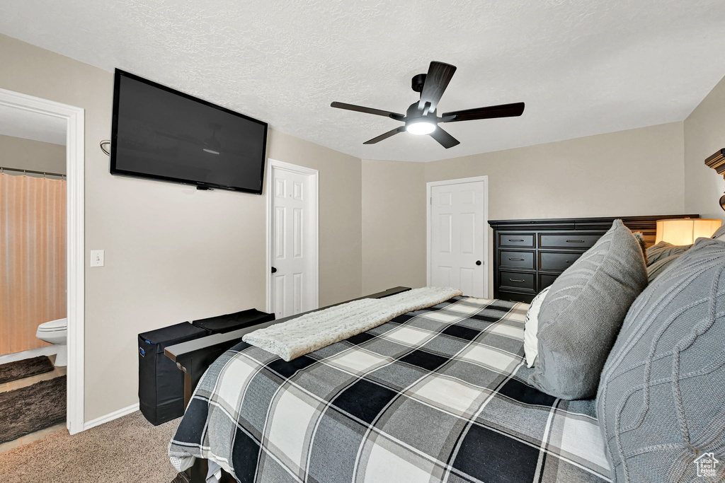 Bedroom featuring carpet flooring and a ceiling fan
