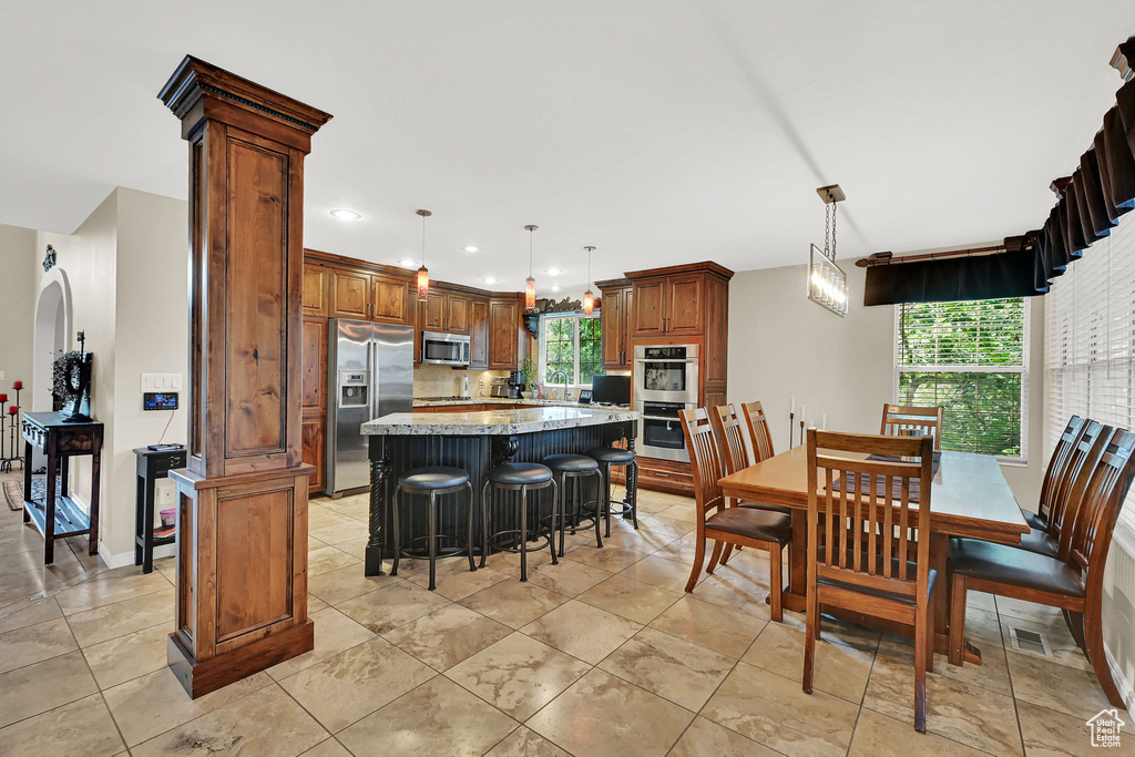 Dining area featuring recessed lighting
