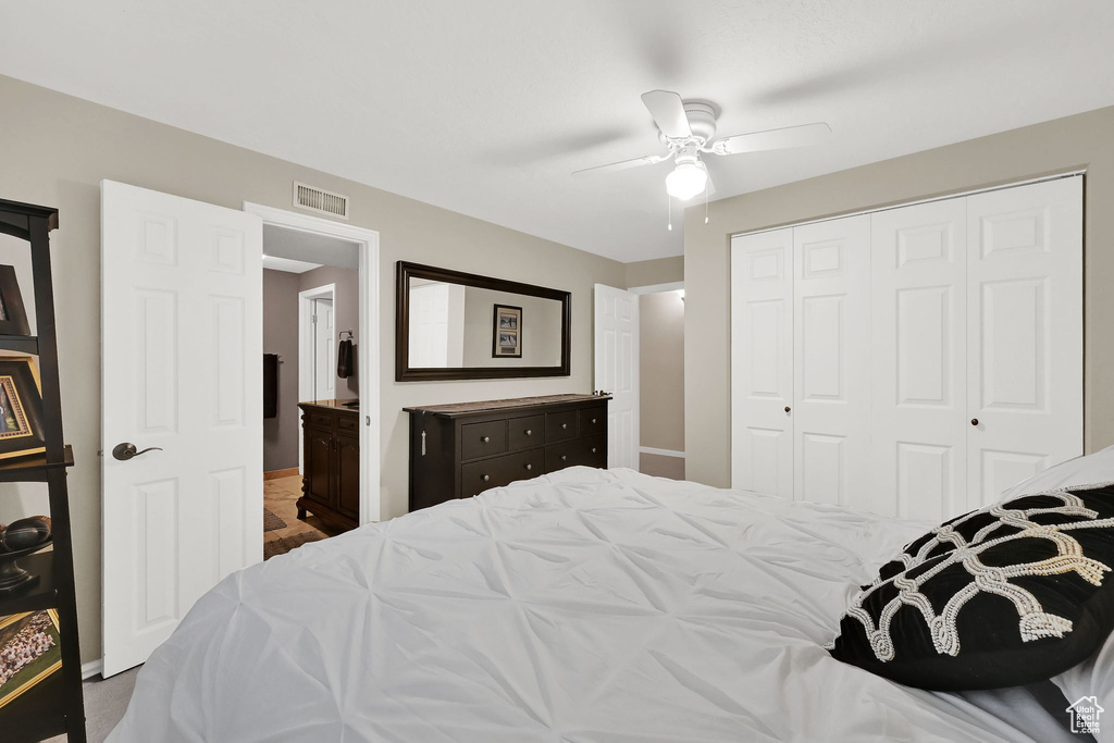 Bedroom with a closet and ceiling fan