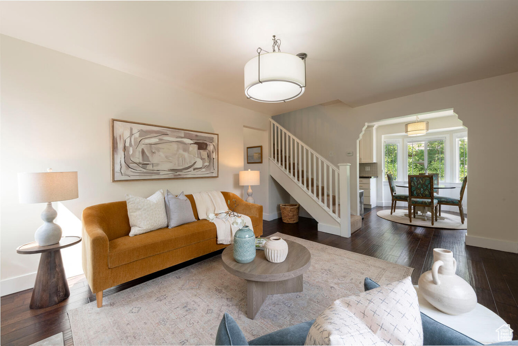 Living area featuring stairs and hardwood / wood-style floors