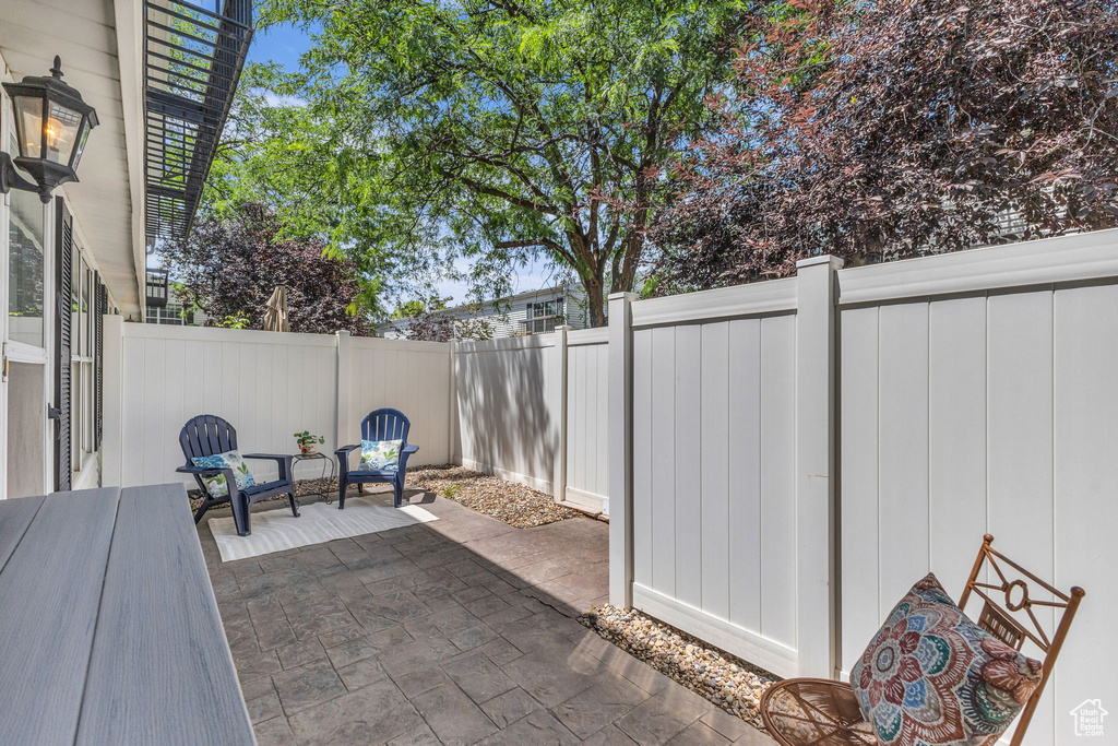 Fenced backyard featuring a patio area