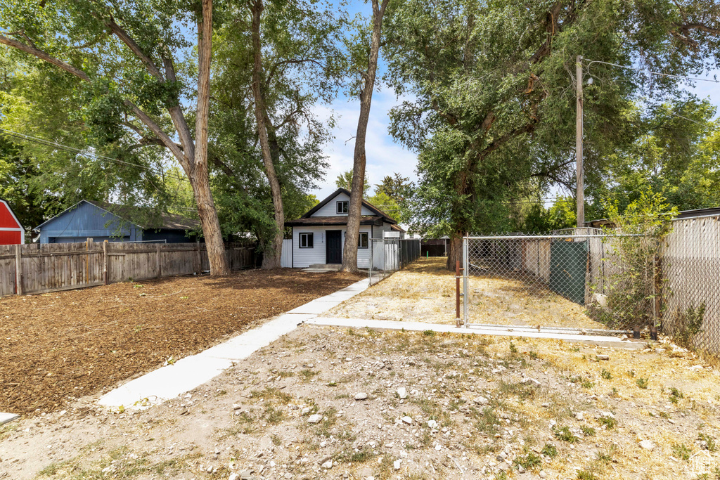 View of fenced backyard