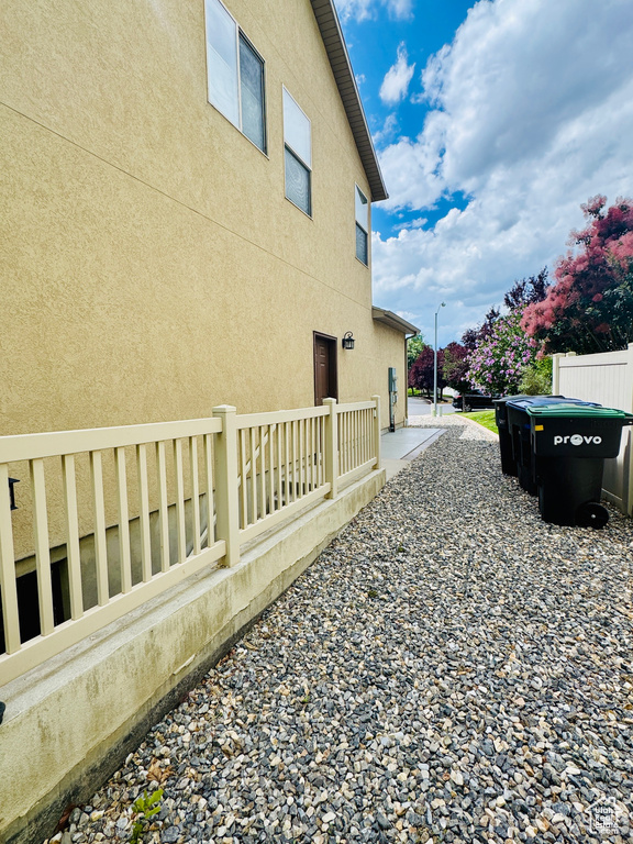 View of side of property with stucco siding