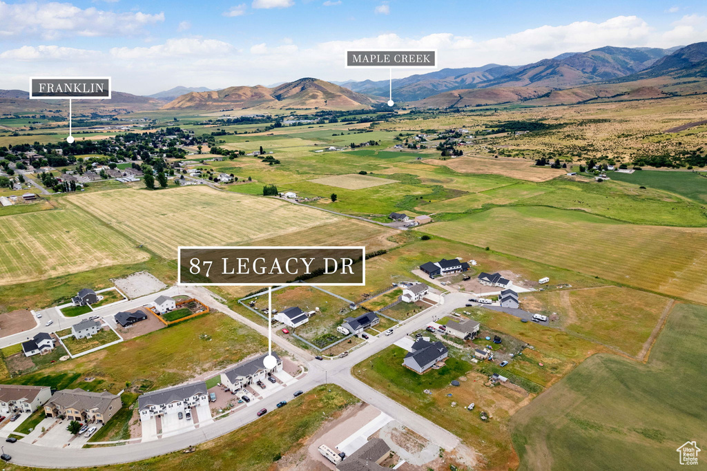 Aerial view of property's location with mountains