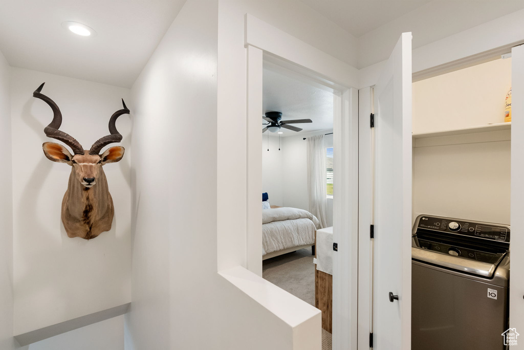 Washroom featuring washer / clothes dryer, a ceiling fan, recessed lighting, and carpet