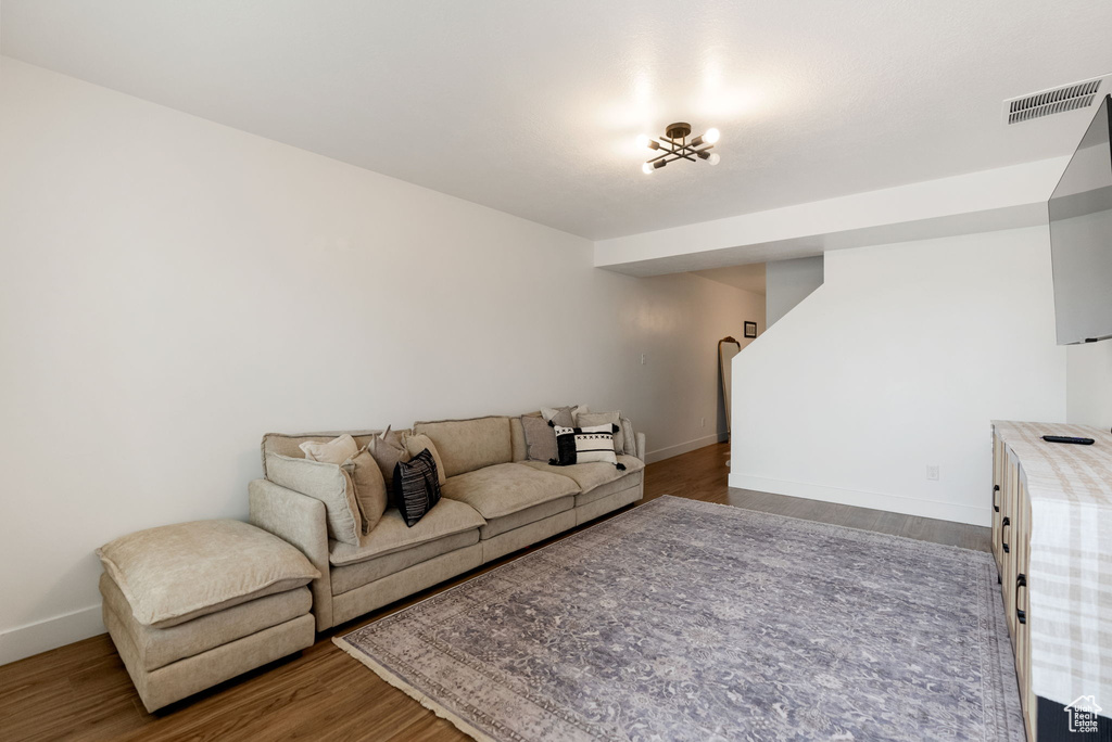 Living room featuring baseboards and wood finished floors